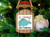 Sleigh ornament with "Merry Christmas From Lake Pontchartrain" text on tree