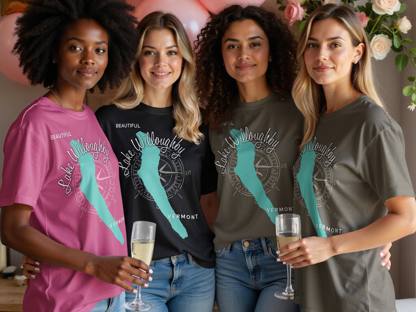 Four women wear t-shirts with "Lake Willoughby Vermont" text and compass design.