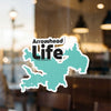 Teal Arrowhead Life sticker with black text, on a window.