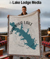 Waurika Lake Oklahoma map woven blanket held by a smiling man.