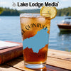 Iced tea glass with Quinault map design on Lake Lodge Media logo background.