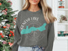 Gray sweatshirt featuring a turquoise Geneva Lake map over a compass and "Geneva Lake Wisconsin".