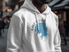White hoodie with "Lake Hefner Oklahoma" printed on a blue map graphic.