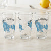 Three clear glasses with blue Marco Island, Florida map and compass design.