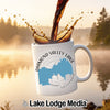 White mug with "Diamond Valley Lake California" map design, coffee splashing.