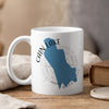 White mug with blue outline of Washington state and text "Cain Lake".