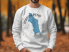 White sweatshirt with Jordan Pond Maine map graphic and compass rose.