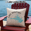 Pillow with Lake Rampart Colorado map design on Adirondack chair by water.