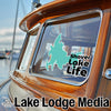 Turquoise map sticker on boat window with "Shaver Lake Life" text.