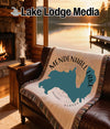 Fringe-trimmed throw with Mendenhall Lake, Alaska map and compass design.