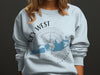 Light blue sweatshirt with Key West Florida map and compass graphic.