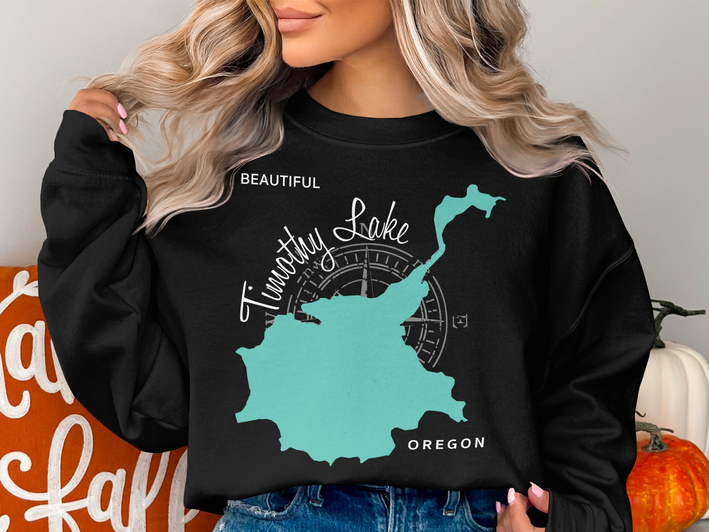 Black sweatshirt with "Beautiful Timothy Lake Oregon" and compass rose graphic.