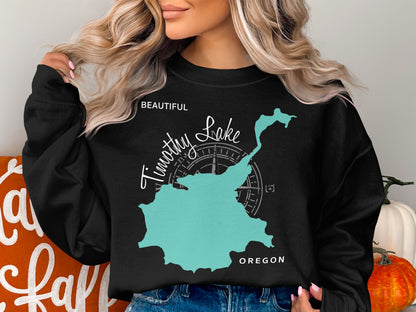 Black sweatshirt with "Beautiful Timothy Lake Oregon" and compass rose graphic.