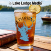 Iced tea in a glass with a lemon slice and "Lake Pleasant" map design.