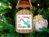 Sled ornament with "Merry Christmas From Whiskeytown Lake" text on a Christmas tree.