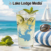 Glass with Lake Jocassee map, lime, mint, and ice on beach background.