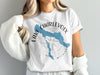 White t-shirt with blue Lake Charlevoix graphic and compass rose.