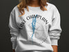 White sweatshirt with Lake Champlain map and compass graphic, "Lake Champlain Vermont" text