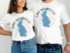 White t-shirts with Lake Monticello South Carolina map and compass design.