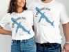 White t-shirts with "Lake Darling" and blue fish graphic over compass.