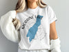 White t-shirt with a blue map graphic of Moraine Lake, Alberta.