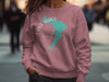 Pink crewneck sweatshirt with a teal Lake Waco map and compass graphic.