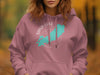 Pink hoodie with a turquoise Sand Lake Ontario map graphic and compass rose.
