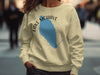 Yellow sweatshirt with blue Lake Mohave map and compass graphic.