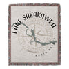 Woven blanket with Lake Sakakawea map and compass design, North Dakota.