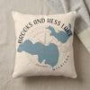 Cream pillow with blue lake map and "Brooks and Hess Lake Michigan" text.