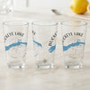 Three clear glasses featuring blue Buckeye Lake map and compass designs.