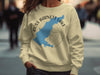 Yellow sweatshirt featuring a blue outline of Ross Barnett Lake, Mississippi with a compass graphic.
