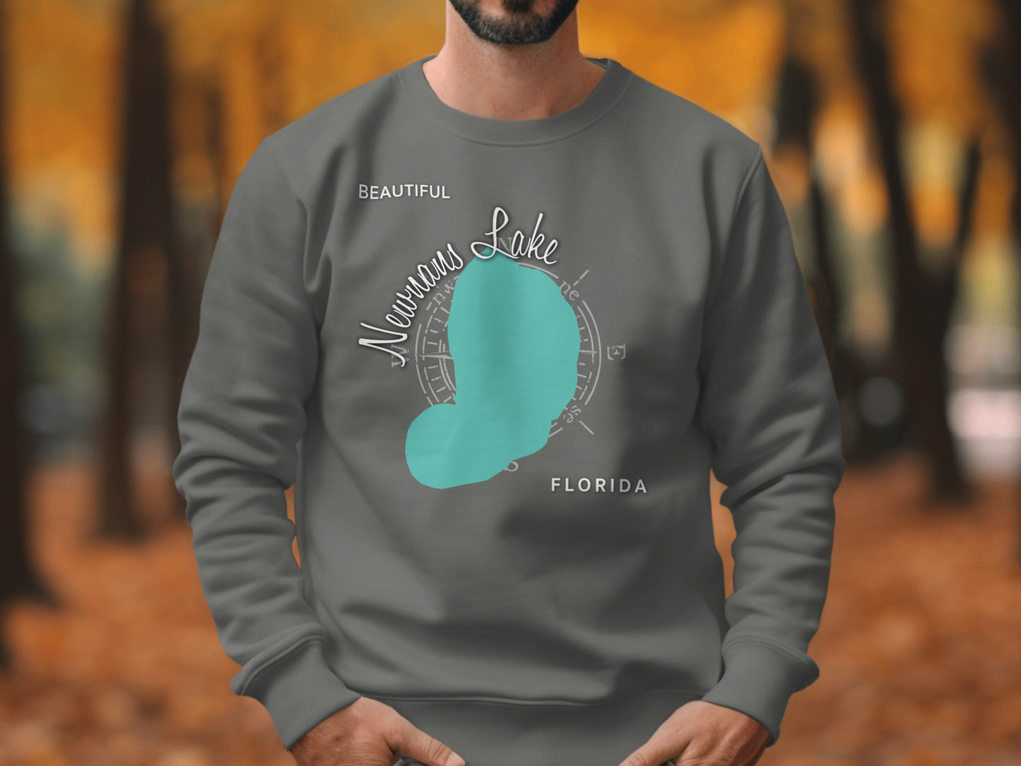 Gray sweatshirt with "Newman's Lake" graphic and compass rose.