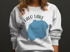 White sweatshirt with Buffalo Lake Minnesota graphic and compass design.