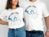 White t-shirts with Saguaro Lake Arizona map and compass graphic.