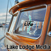 Blackshear Life decal on a boat window, with "Lake Lodge Media" text below.