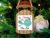 Sled ornament with "Merry Christmas From Glen Lake" text and snowflakes.