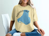 Yellow t-shirt with Emerald Lake Canada graphic and compass.