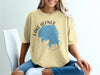 Yellow t-shirt with Lake Hefner Oklahoma map graphic and compass rose detail.