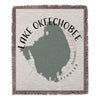 Woven blanket with Lake Okeechobee map outline and compass rose text.