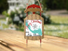 Wooden sled ornament with red runners, "Merry Christmas from Lake Marion".