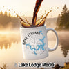 White mug with Lake Texoma map and compass design, coffee pouring.