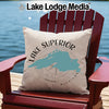 Pillow with Lake Superior map and compass design on a red Adirondack chair.