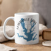 White mug with Lewisville Lake map, compass, and Texas outline.