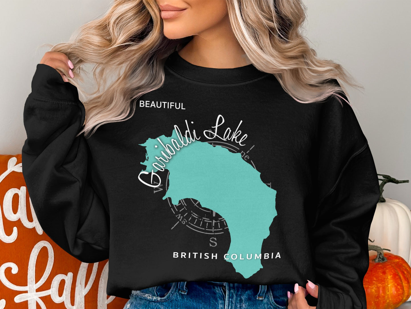 Black sweatshirt with "Beautiful Garibaldi Lake British Columbia" text and turquoise map outline.