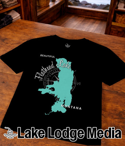 Black t-shirt with a turquoise compass rose map of Flathead Lake, Montana.