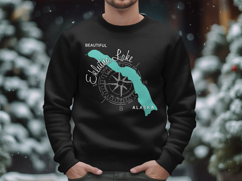 Black sweatshirt featuring a compass rose and outline of Eklutna Lake, Alaska.