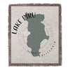 Woven blanket with Lake Piru outline map, compass rose, and text "CALIFORNIA".