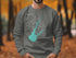 Grey sweatshirt with Folsom Lake map and compass design.