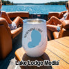 A white stainless steel tumbler on a wooden boat table, featuring a Newnans Lake Florida map design.